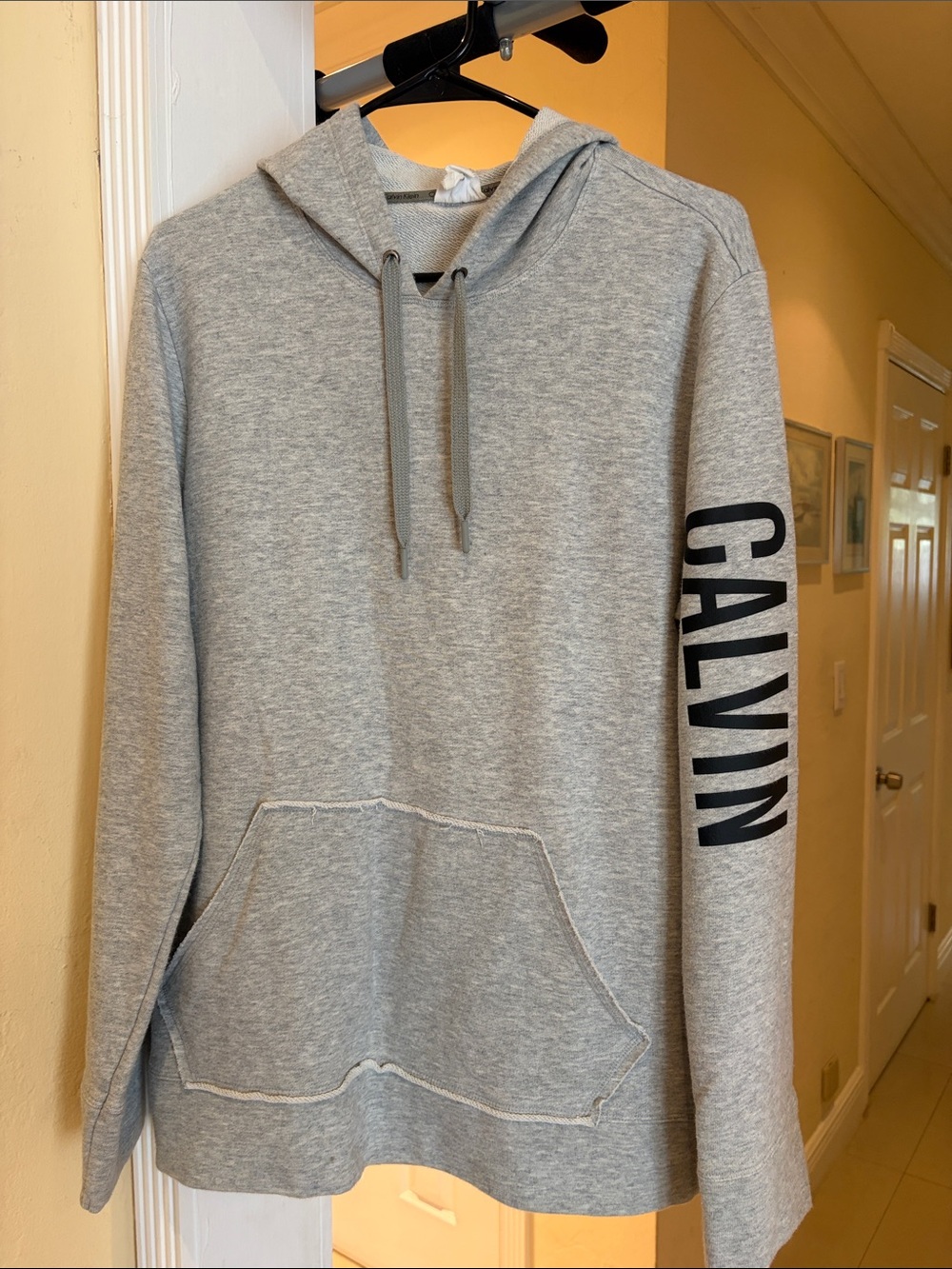 Calvin Klein Light Gray Pullover Hoodie with Black Sleeve Logo
